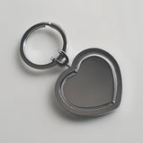 Silver rotating heart keyring