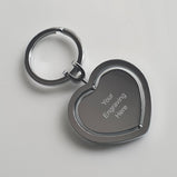 Engraved Silver rotating heart keyring